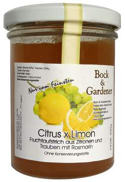 Citrus x limon Zitrone mit Weintrauben und Rosmarin